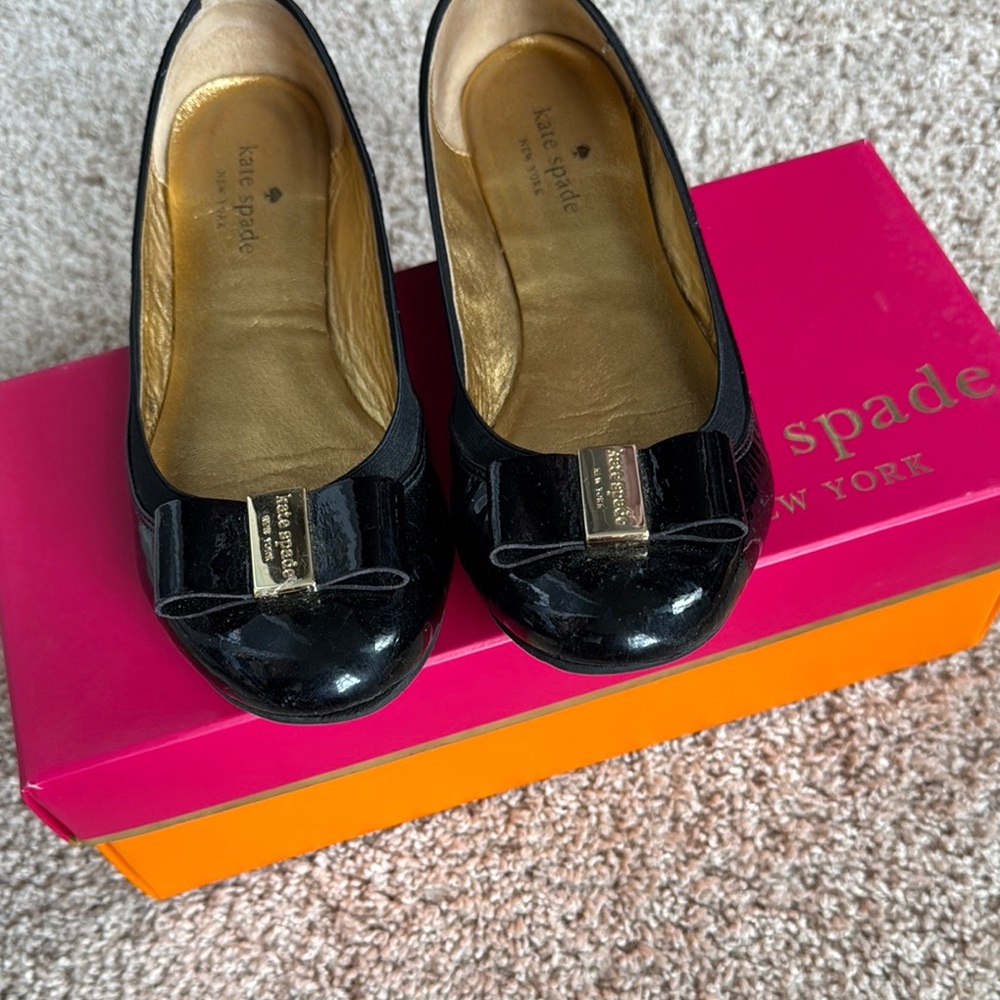 Kate Spade Glossy Black Flats with Gold Bow